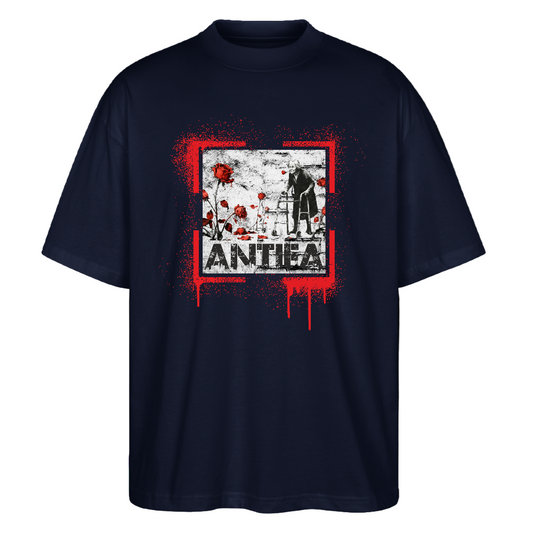 Navy oversized tee with red paint splatter frame, elderly person with walker and red roses; ANTHEA below.